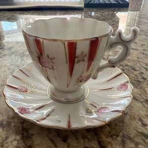 Elegant Red and Gold Teacup and Saucer Set